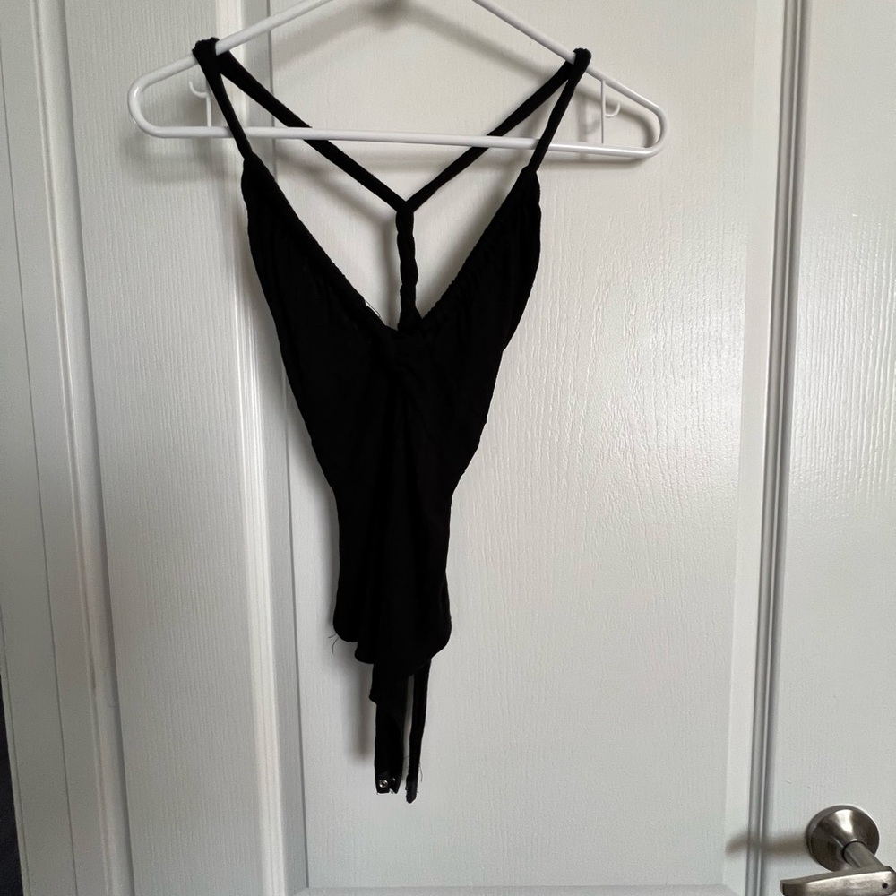 Black ribbed vneck body suit.